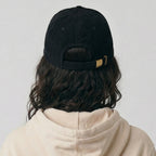 dissociating corduroy hat.