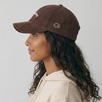 dissociating corduroy hat.