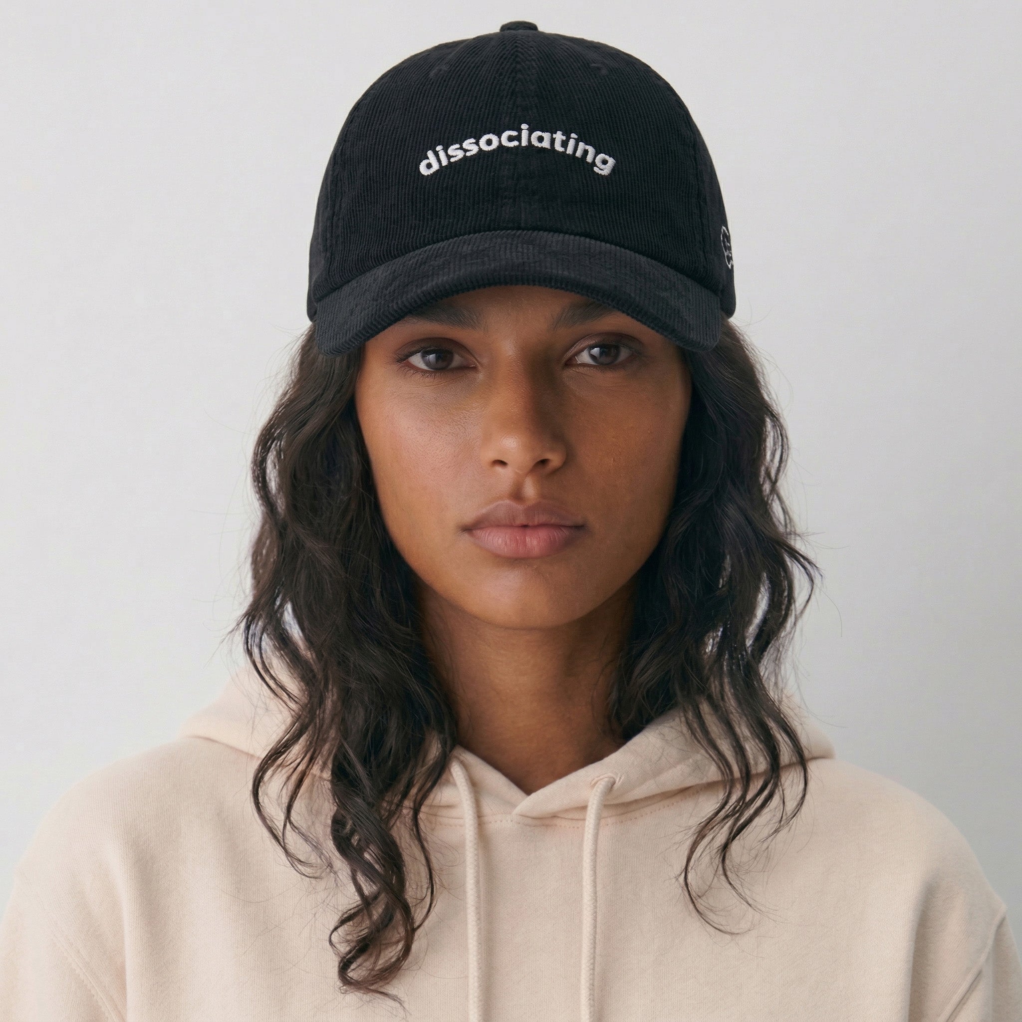 dissociating corduroy hat.