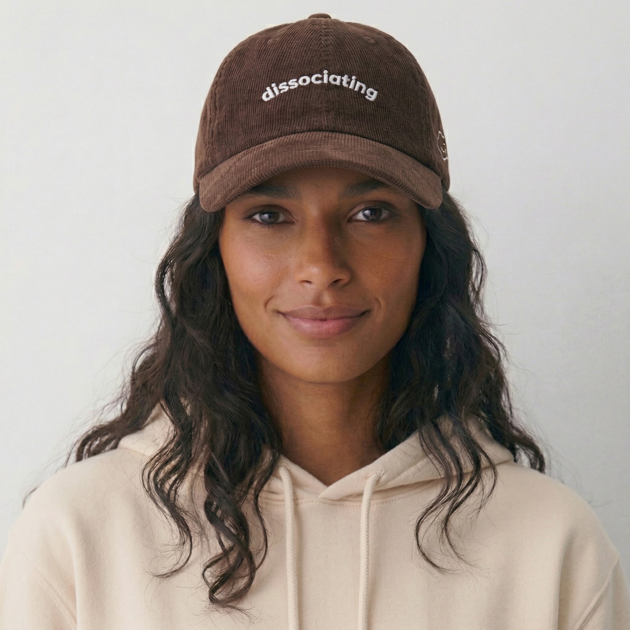 dissociating corduroy hat.